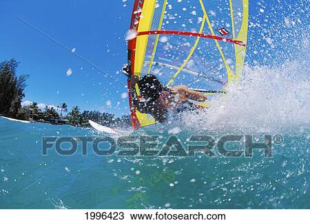 Hawaii, Maui, Kanaha, Action View Woman Windsurfing, View From Behind With Spray View Large Photo Image Stock Image - Hawaii, Maui, Kanaha, Action View Woman Windsurfing, View From Behind With Spray. Fotosearch