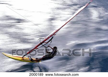 Hawaii, Maui, Kanaha Beach Park, Action Shot Of Windsurfer. For Editorial Use Only. View Large Photo Image Stock Photo - Hawaii, Maui, Kanaha Beach Park, Action Shot Of Windsurfer. For Editorial Use Only.. Fotosearch