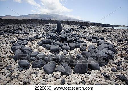 Hawaii, Maui, Kanaio, A Rock Formation Along Coast With Haleakala In The Background View Large Photo Image Stock Photo - Hawaii, Maui, Kanaio, A Rock Formation Along Coast With Haleakala In The Background. Fotosearch