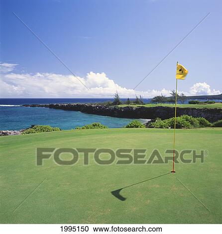 Stock Image - Hawaii, Maui, Kapalua Golf Course, Bay Course, Fairway Along The Ocean.. Fotosearch