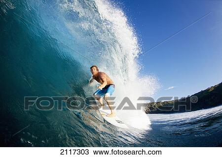 Stock Image - Hawaii, Maui, Kapalua, Professional surfer Kevin Sullivan rides a wave at Honolua Bay. EDITORIAL USE ONLY.. Fotosearch