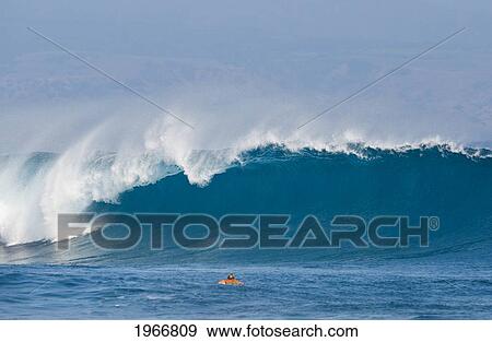 Hawaii, Maui, Kapalua, Surfer Paddling Out Towards Large Breaking Wave View Large Photo Image Stock Photo - Hawaii, Maui, Kapalua, Surfer Paddling Out Towards Large Breaking Wave. Fotosearch