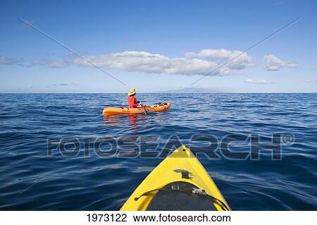 Stock Image - Hawaii, Maui, Kayakers On The South Coast Of Maui.. Fotosearch