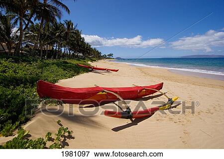 Stock Photo - Hawaii, Maui, Kihei, Keawakapu Beach, Red Outrigger Canoe On Sandy Shore.. Fotosearch