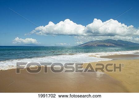 Hawaii, Maui, Kihei, Ocean And Sand, West Maui Mountains In The Distance. View Large Photo Image Stock Image - Hawaii, Maui, Kihei, Ocean And Sand, West Maui Mountains In The Distance.. Fotosearch