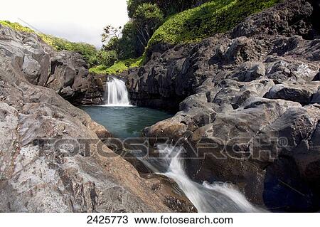 Hawaii, Maui, Kipahulu, A waterfall in the seven sacred pools. View Large Photo Image Stock Image - Hawaii, Maui, Kipahulu, A waterfall in the seven sacred pools.. Fotosearch