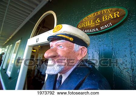 Stock Image - Hawaii, Maui, Lahaina, Captain At Pioneer Inn. Editorial Use Only.. Fotosearch