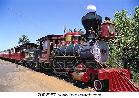 Hawaii, Maui, Lahaina, Close-Up Of Red And Black Train On Tracks, Blue Sky, Steam View Large Photo Image Stock Photo - Hawaii, Maui, Lahaina, Close-Up Of Red And Black Train On Tracks, Blue Sky, Steam. Fotosearch
