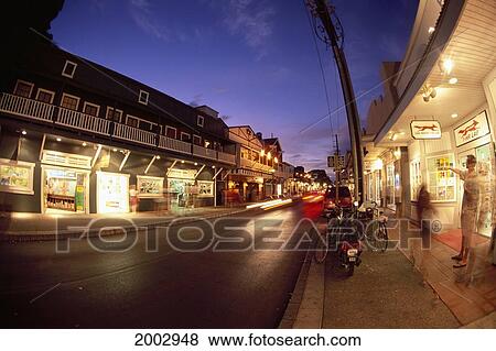 Hawaii, Maui, Lahaina, Storefronts Of Front Street At Twilight, Blurred Car And People View Large Photo Image Stock Photo - Hawaii, Maui, Lahaina, Storefronts Of Front Street At Twilight, Blurred Car And People. Fotosearch