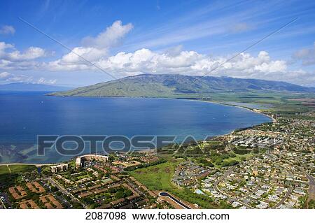 Hawaii, Maui, Maalaea Bay, aerial of coast and North Kihei in the background View Large Photo Image Stock Photo - Hawaii, Maui, Maalaea Bay, aerial of coast and North Kihei in the background. Fotosearch