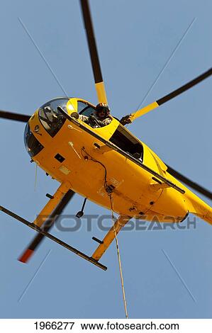 Hawaii, Maui, Ma'alaea, Fire Helicopter Working To Put Out Wildfie. Editorial Use Only. View Large Photo Image Stock Photo - Hawaii, Maui, Ma'alaea, Fire Helicopter Working To Put Out Wildfie. Editorial Use Only.. Fotosearch