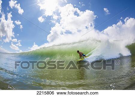 Hawaii, Maui, Maalaea, Professional Surfer Patri McLaughlin rides a wave at legendary surf break know as Freight Trains. View Large Photo Image Stock Photograph - Hawaii, Maui, Maalaea, Professional Surfer Patri McLaughlin rides a wave at legendary surf break know as Freight Trains.. Fotosearch