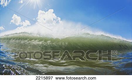 Stock Photo - Hawaii, Maui, Maalaea, Wave breaking at legendary surf spot Freight Trains. Fotosearch