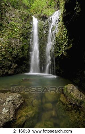 Stock Photo - Hawaii, Maui, Makamakaole Gulch, Waihee Ridge Trail, Waterfall and pond.. Fotosearch