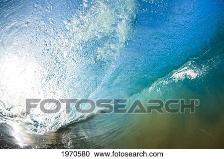 Stock Image - Hawaii, Maui, Makena Beach, Beautiful Wave Breaking Along Shore.. Fotosearch