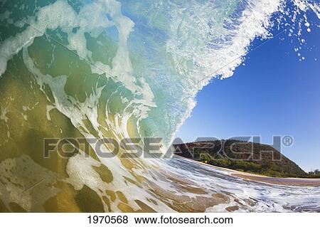 Stock Photo - Hawaii, Maui, Makena Beach, Beautiful Wave Breaking Along Shore.. Fotosearch