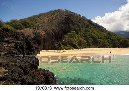 Stock Image - Hawaii, Maui, Makena Beach, Rocky Cliffs On The Shore. (Editorial Use Only). Fotosearch