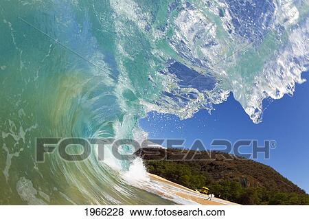 Stock Photo - Hawaii, Maui, Makena Beach, Wave Breaking Along Shore.. Fotosearch