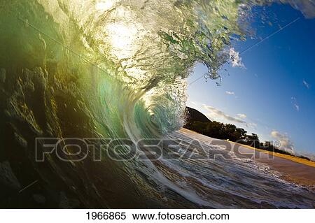 Stock Photography - Hawaii, Maui, Makena, Beautiful Wave At Sunset, View From Inside The Barrel. Fotosearch