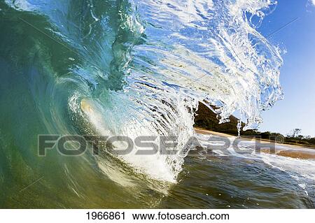Stock Image - Hawaii, Maui, Makena, Beautiful Wave Breaking, View From Inside The Barrel. Fotosearch