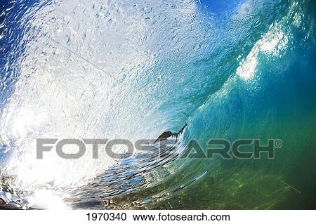 Stock Image - Hawaii, Maui, Makena, Beautiful Wave Breaking Along Shore. Fotosearch