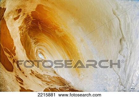 Stock Image - Hawaii, Maui, Makena, Beautiful wave breaking at the beach.. Fotosearch
