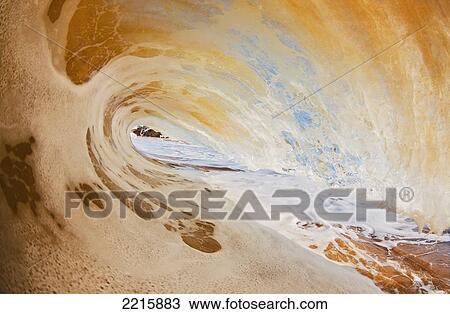 Stock Image - Hawaii, Maui, Makena, Beautiful wave breaking at the beach.. Fotosearch