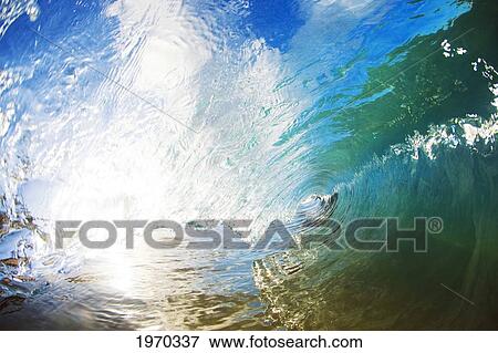 Stock Photo - Hawaii, Maui, Makena, Beautiful Wave Breaking Along Shore. Fotosearch