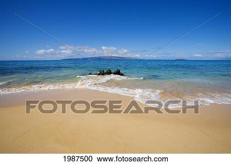 Stock Image - Hawaii, Maui, Makena, Big Beach, Sandy Beach On A Beautiful Tropical Day.. Fotosearch