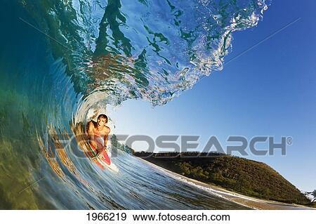 Hawaii, Maui, Makena - Big Beach, Boogie Boarder Riding Barrel Of Beautiful Wave, Sunrise Light. View Large Photo Image Stock Photo - Hawaii, Maui, Makena - Big Beach, Boogie Boarder Riding Barrel Of Beautiful Wave, Sunrise Light.. Fotosearch
