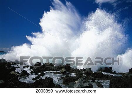 Stock Photo - Hawaii, Maui, Makena Coast, Surf Crashing Along Lava Rock Shoreline. Fotosearch
