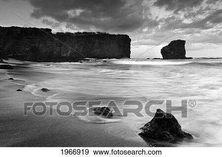 Stock Photo - Hawaii, Maui, Makena, Dramatic Vibrant Sunset On The Beach In South Maui. Fotosearch