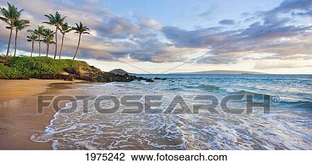 Stock Image - Hawaii, Maui, Makena, Secret Beach At Sunset.. Fotosearch