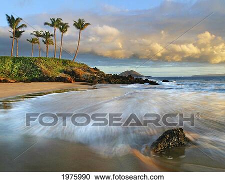 Stock Image - Hawaii, Maui, Makena, Secret Beach At Sunset.. Fotosearch