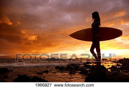 Stock Photo - Hawaii, Maui, Makena, Silhouette Of Surfer Girl At Sunset. Fotosearch