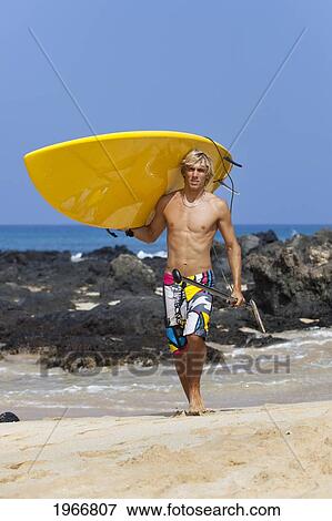 Hawaii, Maui, Makena, Stand Up Paddle Surfer With Board On Beach View Large Photo Image Stock Photo - Hawaii, Maui, Makena, Stand Up Paddle Surfer With Board On Beach. Fotosearch