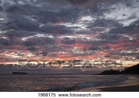 Stock Photography - Hawaii, Maui, Makena State Park, Oneloa Or Big Beach, Water Lapping Onto Shore At Sunset.. Fotosearch