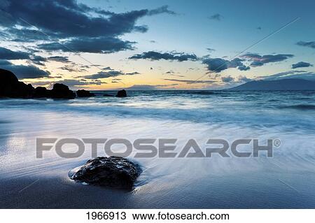 Stock Image - Hawaii, Maui, Makena, Twilight At Black Sand Beach. Fotosearch