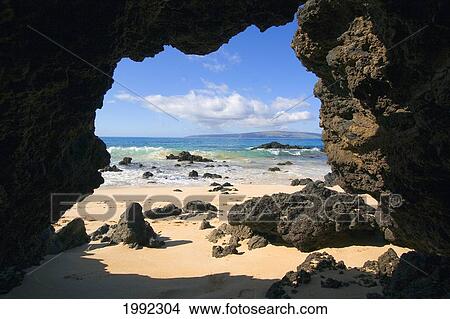 Hawaii, Maui, Makena, View From Secret Beach Of Kahoolawe Framed By Lava Tube. View Large Photo Image Picture - Hawaii, Maui, Makena, View From Secret Beach Of Kahoolawe Framed By Lava Tube.. Fotosearch