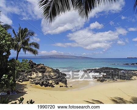 Stock Image - Hawaii, Maui, Makena, View From Secret Beach Of Kahoolawe And Molokini Islands.. Fotosearch