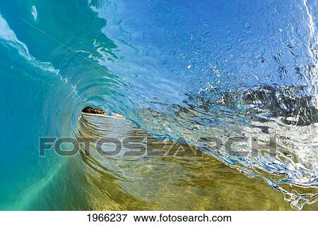 Stock Photo - Hawaii, Maui, Makena, View Through Tube Of Glassy Wave.. Fotosearch