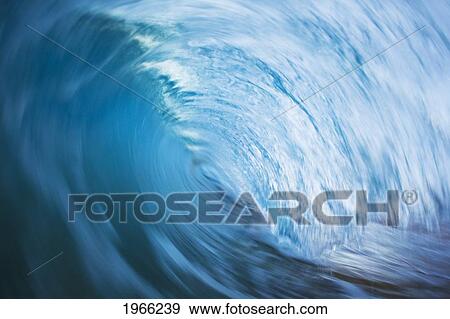Stock Photo - Hawaii, Maui, Makena, View Through Tube Of Blue Wave, Long Exposure.. Fotosearch
