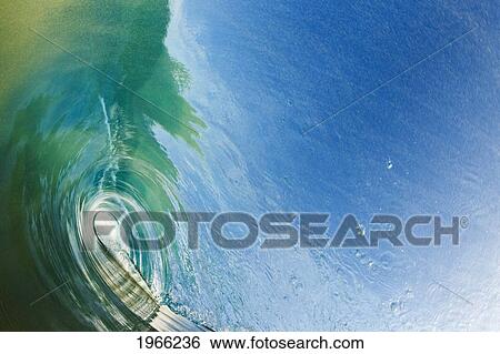 Hawaii, Maui, Makena, View Through Tube Of Glassy Wave. View Large Photo Image Stock Photograph - Hawaii, Maui, Makena, View Through Tube Of Glassy Wave.. Fotosearch