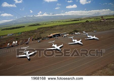 Stock Photo - Hawaii, Maui, Maui International Airport, Executive Travel, Private Jets.. Fotosearch