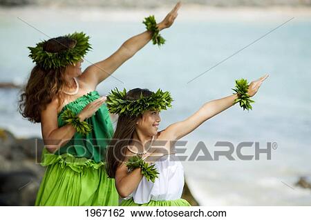 Hawaii, Maui, Mother And Daughter Dancing Hula Together. View Large Photo Image Stock Image - Hawaii, Maui, Mother And Daughter Dancing Hula Together.. Fotosearch