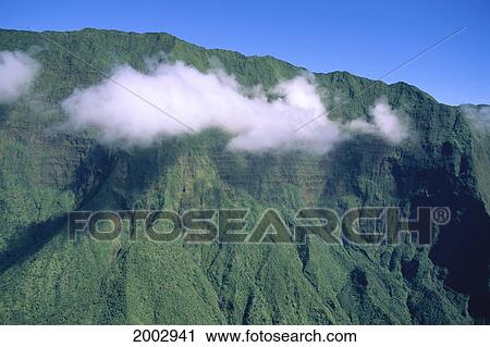Hawaii, Maui, Mountains From Helicopter With Cloud In Front Of Green Ridges, Blue Sky View Large Photo Image Stock Image - Hawaii, Maui, Mountains From Helicopter With Cloud In Front Of Green Ridges, Blue Sky. Fotosearch