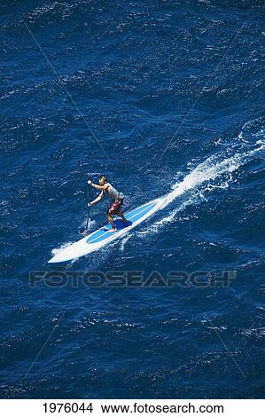 Hawaii, Maui, North Shore, Mark Raaphorst Stand Up Paddling. View Large Photo Image Picture - Hawaii, Maui, North Shore, Mark Raaphorst Stand Up Paddling.. Fotosearch