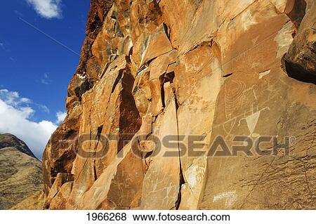 Stock Photo - Hawaii, Maui, Olowalu, Ancient Hawaiian Petroglyphs On Rock Cliffside.. Fotosearch