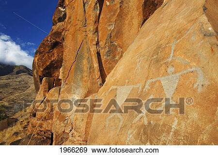 Hawaii, Maui, Olowalu, Ancient Hawaiian Petroglyphs On Rock Cliffside. View Large Photo Image Stock Photo - Hawaii, Maui, Olowalu, Ancient Hawaiian Petroglyphs On Rock Cliffside.. Fotosearch