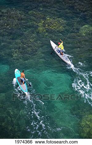 Stock Photograph - Hawaii, Maui, Olowalu, Stand Up Paddling.. Fotosearch